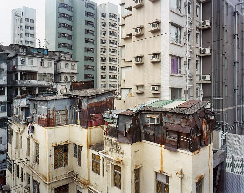 Source: Rufina Wu / Stefan Canham: Portraits from Above –  Hong Kong's Informal Rooftop Communities",   Peperoni Books, Berlin 2008.